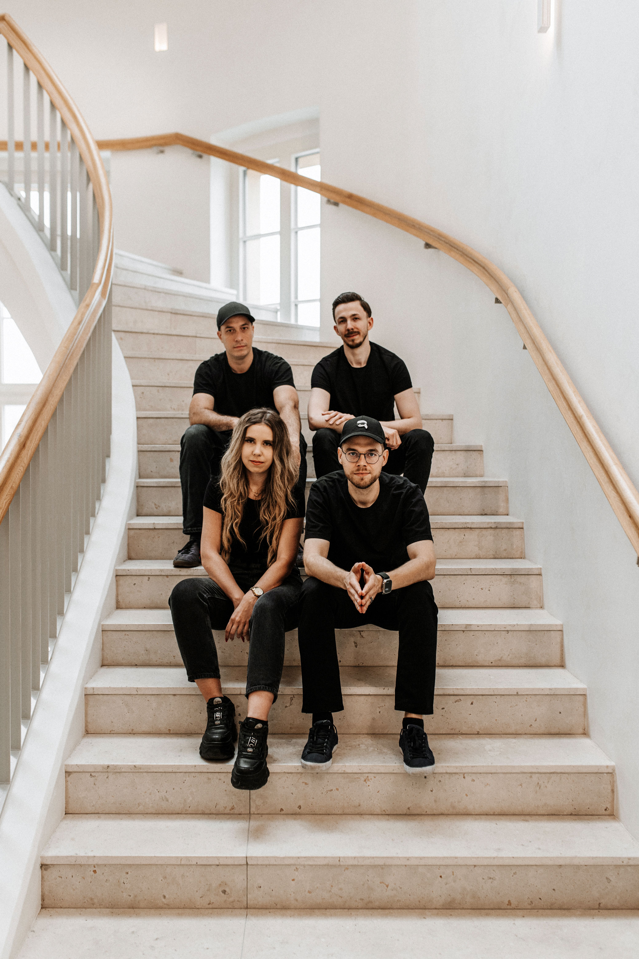 Heveli team on the stairs